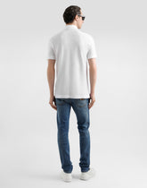 Skinny stretch cotton jeans with tag -  | Dolce &amp; Gabbana