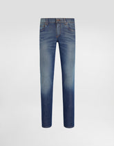 Skinny jeans in stretch cotton with logo embroidery -  | Dolce &amp; Gabbana