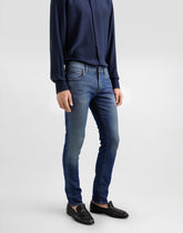 Skinny jeans in stretch cotton with logo embroidery -  | Dolce &amp; Gabbana