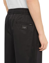 Stretch cotton jogging pants with tag -  | Dolce & Gabbana