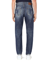 Washed blue regular-fit jeans with rips -  | Dolce & Gabbana