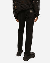 Black wash regular-fit jeans with abrasions -  | Dolce &amp; Gabbana