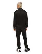 Loose black wash jeans with rips -  | Dolce & Gabbana