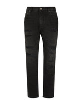 Loose black wash jeans with rips -  | Dolce &amp; Gabbana