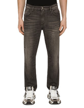 WASHED STRETCH DENIM LOOSE JEANS -  | Dolce & Gabbana