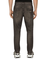 WASHED STRETCH DENIM LOOSE JEANS -  | Dolce & Gabbana