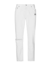 Loose white jeans with rips and abrasions -  | Dolce & Gabbana