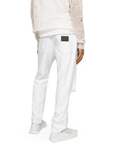 Loose white jeans with rips and abrasions -  | Dolce & Gabbana