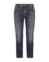 Loose fit washed stretch jeans with subtle abrasions -  | Dolce &amp; Gabbana