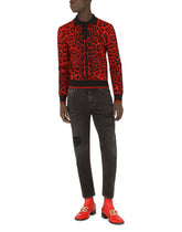 Loose black wash jeans with rips and DG patch -  | Dolce &amp; Gabbana
