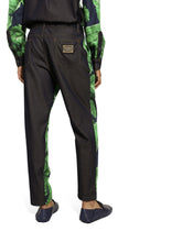Loose blue denim and silk jeans with banana tree print -  | Dolce &amp; Gabbana