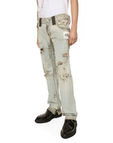 Washed dirty denim jeans with rips -  | Dolce &amp; Gabbana