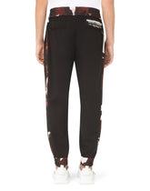 Wool jogging pants with camouflage-print details -  | Dolce & Gabbana