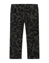 Baggy stretch jeans with flocked logo print -  | Dolce & Gabbana