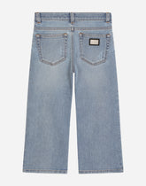 Loose light blue wash jeans with rips -  | Dolce &amp; Gabbana