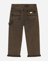 Treated denim jeans with logo tag -  | Dolce &amp; Gabbana