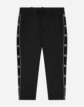 Stretch woolen pants with logo band -  | Dolce &amp; Gabbana