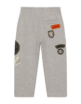 Jogging pants with decorative patches -  | Dolce & Gabbana