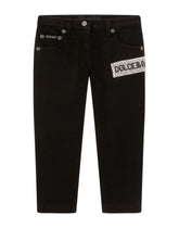 Slim-fit jeans with fusible rhinestone appliqués -  | Dolce & Gabbana