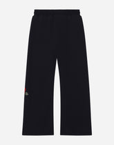 Jersey jogging pants with logo and rose print -  | Dolce &amp; Gabbana