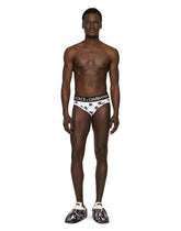 Mid-rise jersey briefs with all-over DG logo print -  | Dolce &amp; Gabbana