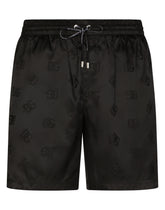 Mid-length swim trunks with DG Monogram print -  | Dolce &amp; Gabbana