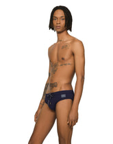 Swim briefs with high-cut leg and branded plate -  | Dolce &amp; Gabbana