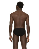 Swim briefs with high-cut leg and branded plate -  | Dolce & Gabbana