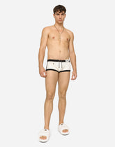 High-legged swim trunks with patch -  | Dolce &amp; Gabbana