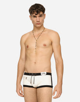 High-legged swim trunks with patch -  | Dolce &amp; Gabbana
