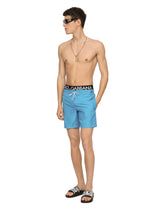 Mid-length swim trunks with metal DG logo -  | Dolce &amp; Gabbana