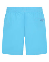 Mid-length swim trunks with metal DG logo -  | Dolce &amp; Gabbana