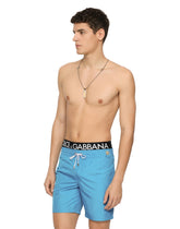 Mid-length swim trunks with metal DG logo -  | Dolce &amp; Gabbana