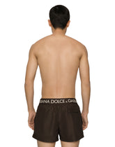 Short swim trunks with branded stretch waistband -  | Dolce & Gabbana