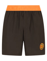 Mid-length swim trunks with patch -  | Dolce &amp; Gabbana