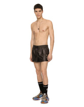 Short swim trunks with heraldic patch -  | Dolce & Gabbana