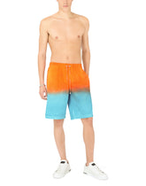 Long swim trunks with tie-dye print -  | Dolce & Gabbana