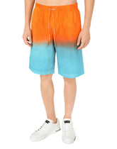 Long swim trunks with tie-dye print -  | Dolce & Gabbana