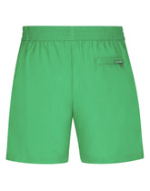 Mid-length swim trunks with DG logo band -  | Dolce & Gabbana