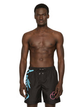 Mid-length swim trunks with spray-paint DG print -  | Dolce &amp; Gabbana