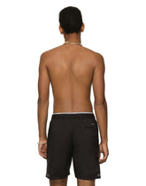 Mid-length swim trunks with DG logo patch -  | Dolce & Gabbana