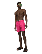 Mid-length swim trunks with embossed DG logo -  | Dolce & Gabbana