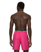 Mid-length swim trunks with embossed DG logo -  | Dolce & Gabbana