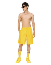 Long-leg swim trunks with embossed DG logo -  | Dolce & Gabbana