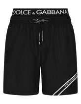 Mid-length swim trunks with branded band -  | Dolce &amp; Gabbana