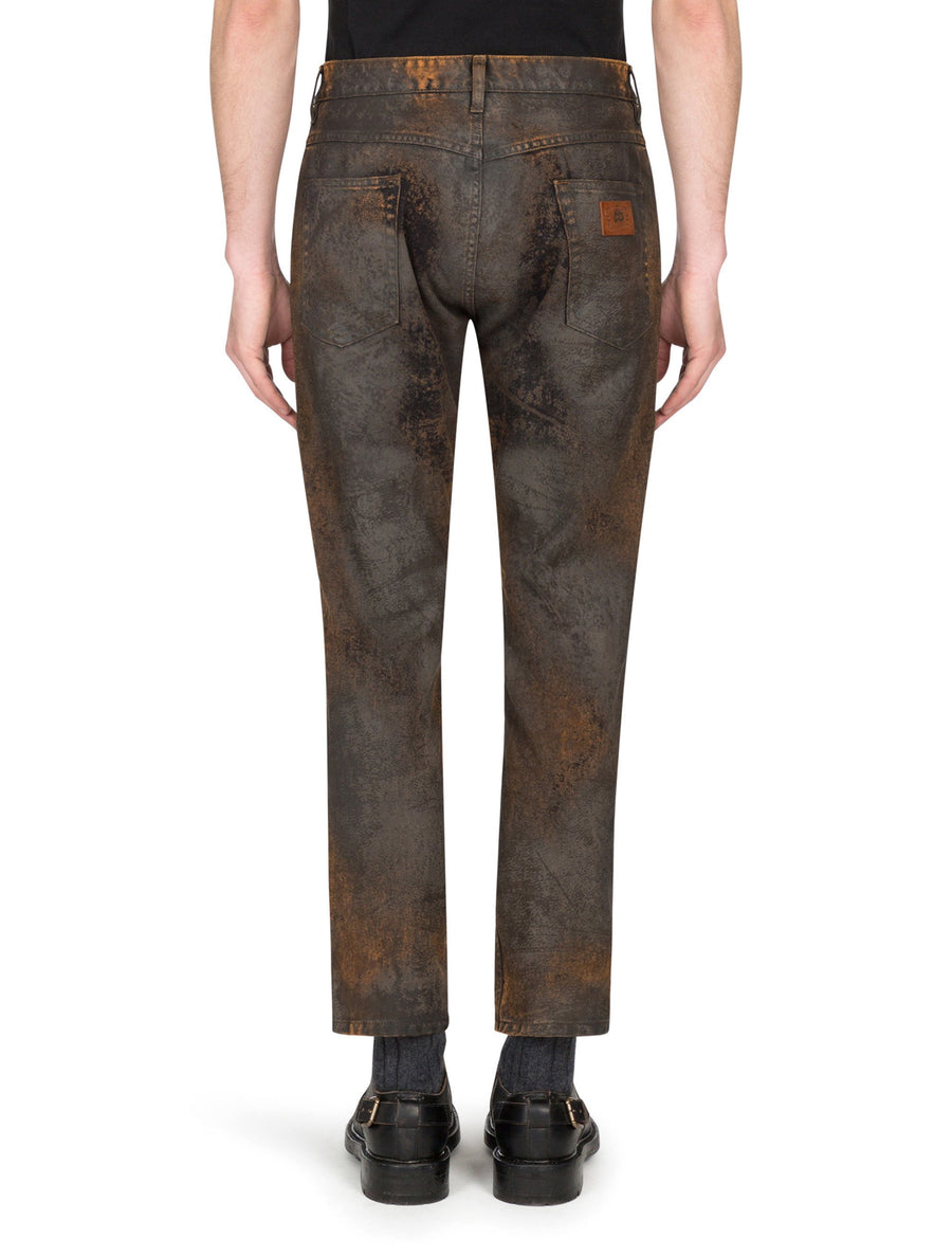 Loose jeans with mud-effect detailing