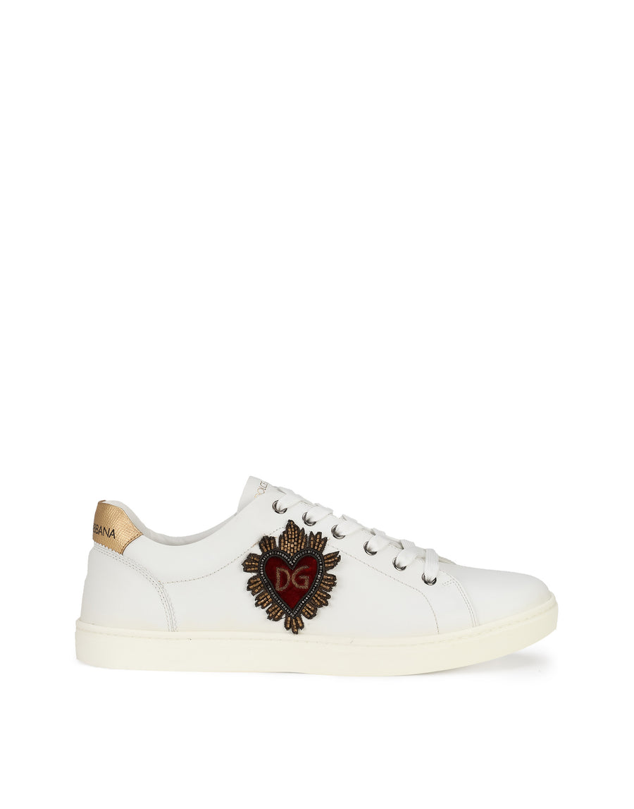 Sneakers with laces and sacred heart