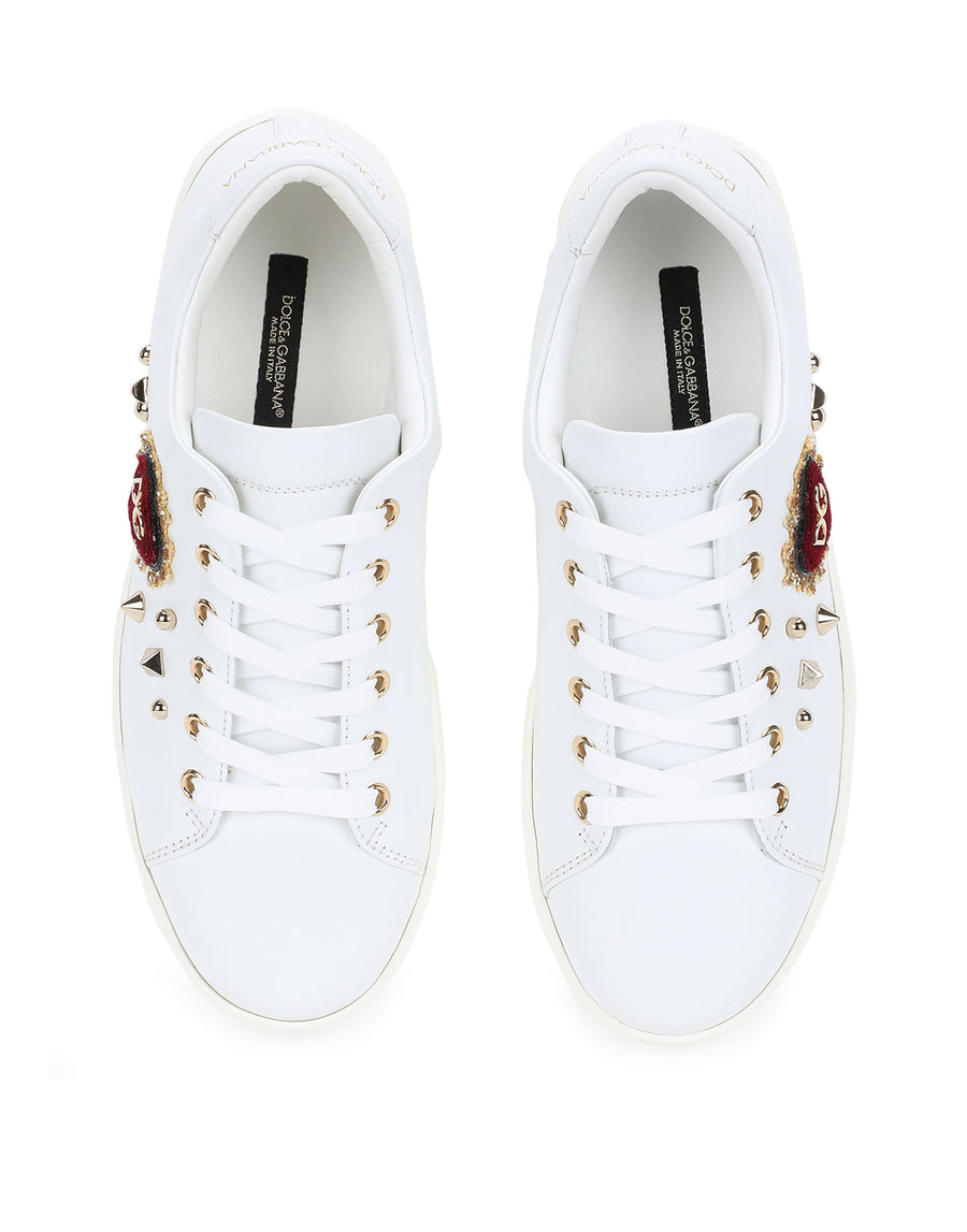 Sneakers with laces and sacred heart patch